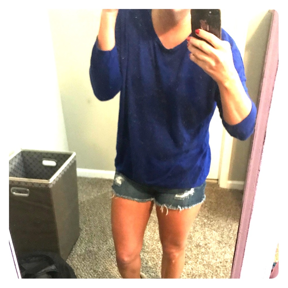 Lightweight blue sweater.
